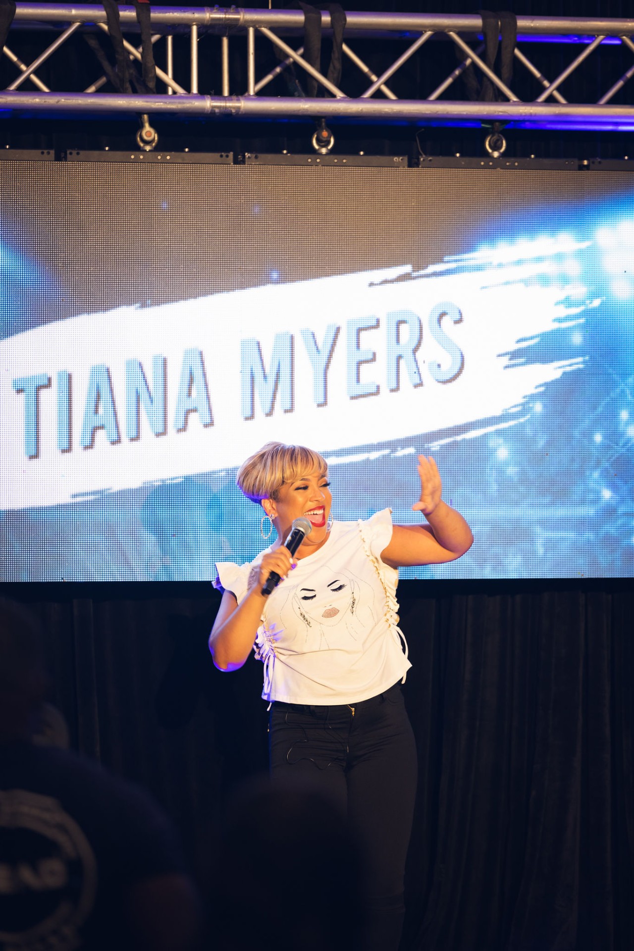 Tiana Myers speaking on stage